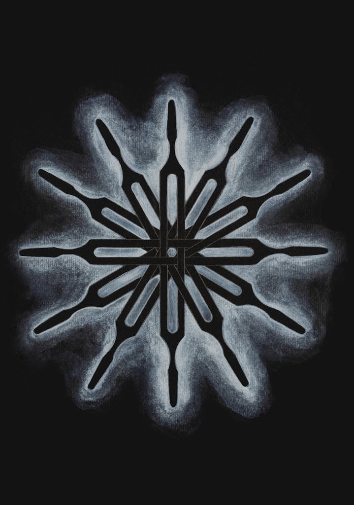 A mandala-like image made from tuning forks on a black background