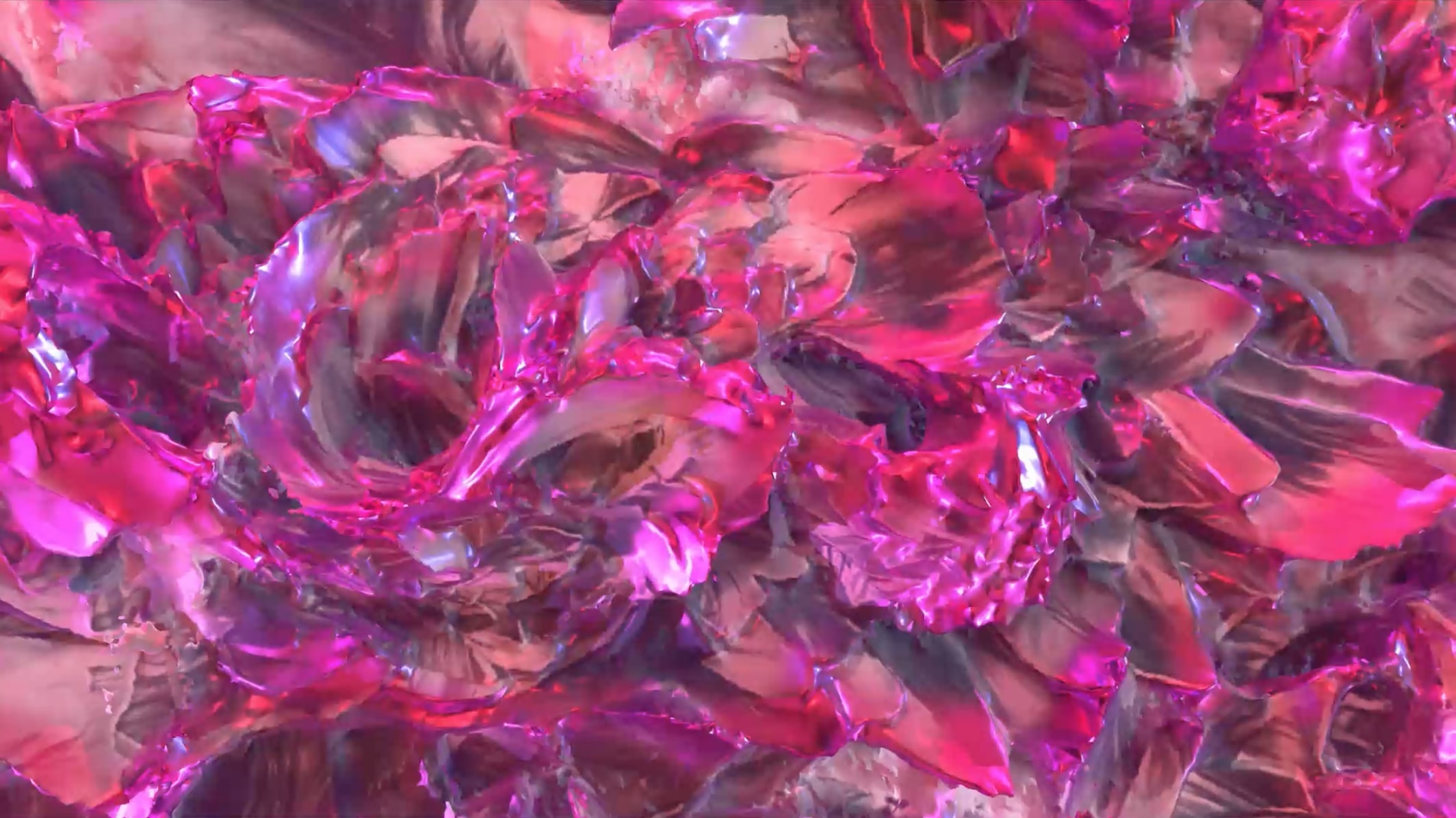 An abstract image showing a swirl of pink glittery shapes