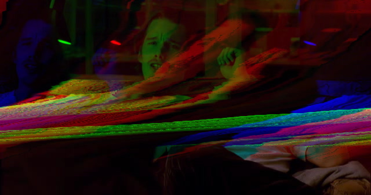 A screenshot of a glitched out frame from a film with Ethan Hawke in it