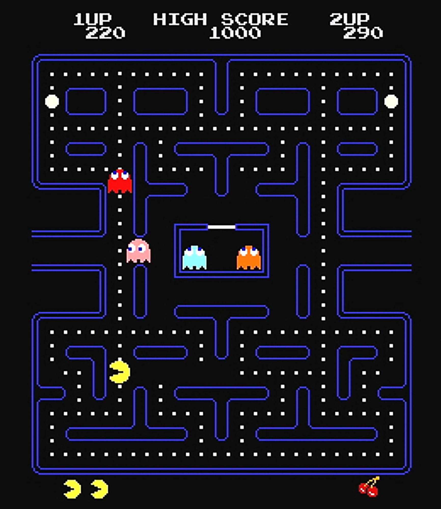 A screen of a game where a yellow circle eats dots in a maze populated by colorful ghosts