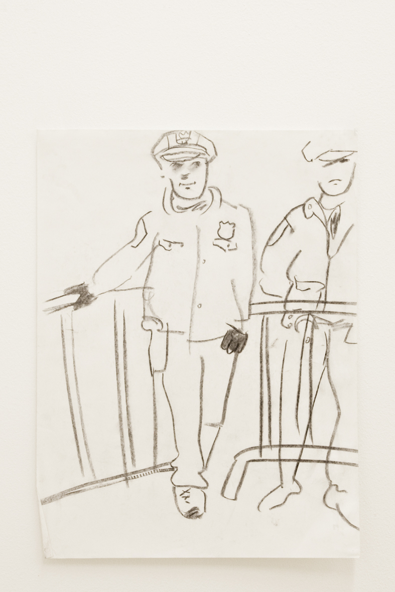 A line drawing of two police officers standing on either side of a pair of barriers