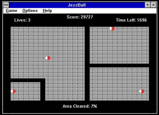 View of a logic based computer game, where colored balls bounce around a gray grid split by black lines